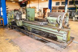 Stanley Gap bed centre lathe S/N: 22 inch swing over gap, 11 ft between centres c/w 4 jaw chuck &