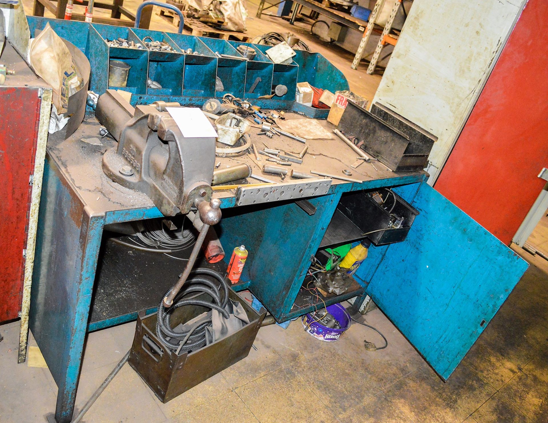 Steel work bench c/w bench vice & contents
