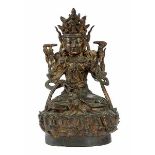 Buddha Höhe: 24 cm. China, 17./ 18. Jahrhundert. Bronze gegossen, Reste ehemaliger Vergoldung.