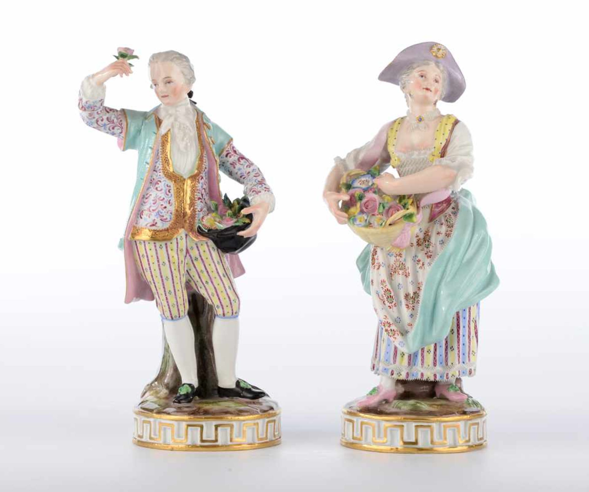 Gärtnerkinder. Zwei Figuren der Knaufzeit um 1850. Meissen, zugeschrieben. Polychrome Bemalung,