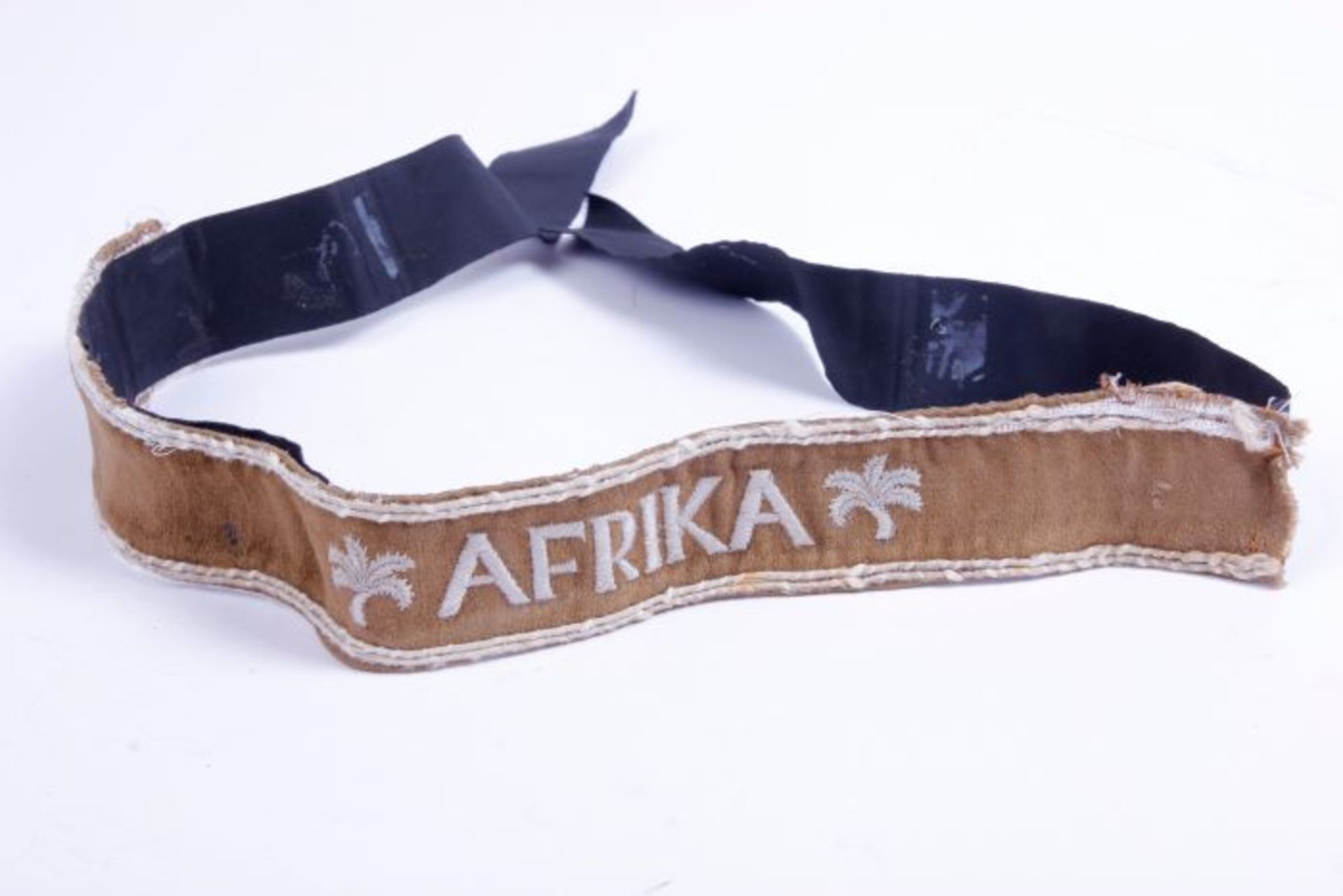 Ärmelband AfrikaÄrmelband Afrika auf Kamelhaar in der Standardausführung, aufgenäht auf ein
