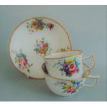 A Spode Trio, moulded and decorated with bright floral sprays, pattern No.