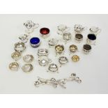 A large collection of silver salt cellars, pairs and mustard pot,