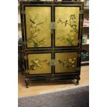 A 20th Century Japanese black lacquered wall side cabinet