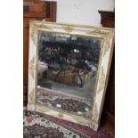 ****Ex Luddington Manor****A 19th Century painted and giltwood framed wall mirror (distressed)