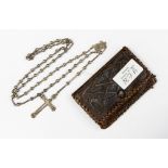 A silver white metal Rosary in an Art Nouveau leather purse