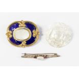 A pinchbeck, French, blue enamel and mother of pearl nineteenth Century brooch,