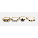 A group of four 9ct gold dress rings, set with sapphires and white stones one a/f,