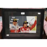 Formula 1 Memorabilia: A framed and signed Fernando Alonso and Jenson Button photograph,
