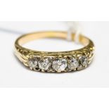 A five stone boat head diamond unmarked yellow gold ring,