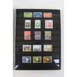 A large stockbook of GB, mint, mint part sheets, blocks, mainly QEII.