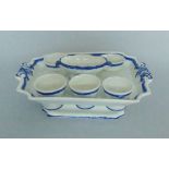 An English Pottery Pearlware Blue and White Egg Cruet Set Comprising of six egg cups,