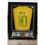 A framed and glazed Pele shirt, signed across middle, replica shirt,