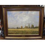 An oil on canvas landscape with cattle,