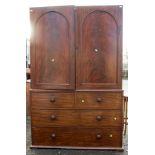 A Victorian mahogany linen press, the upper section with two doors,