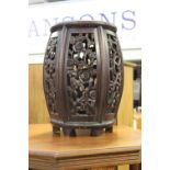 A Chinese hardwood carved jardiniere stand,