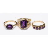 A 9ct ring and amethyst ring, set with an oval cut amethyst, size O1/2,