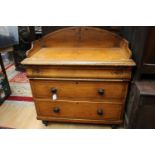 A pine painted chest of drawers with frieze drawer,