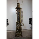 A large Corinthian column gilded,