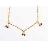 A 9ct gold, diamond ruby and emerald necklace, set with three details each set with a ruby,