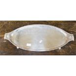 A 19th Century silver-plated drinks tray, plain navette shaped with beaded rim,