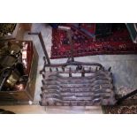 A 19th Century wrought iron fire grate and a pair of fire dogs (3)