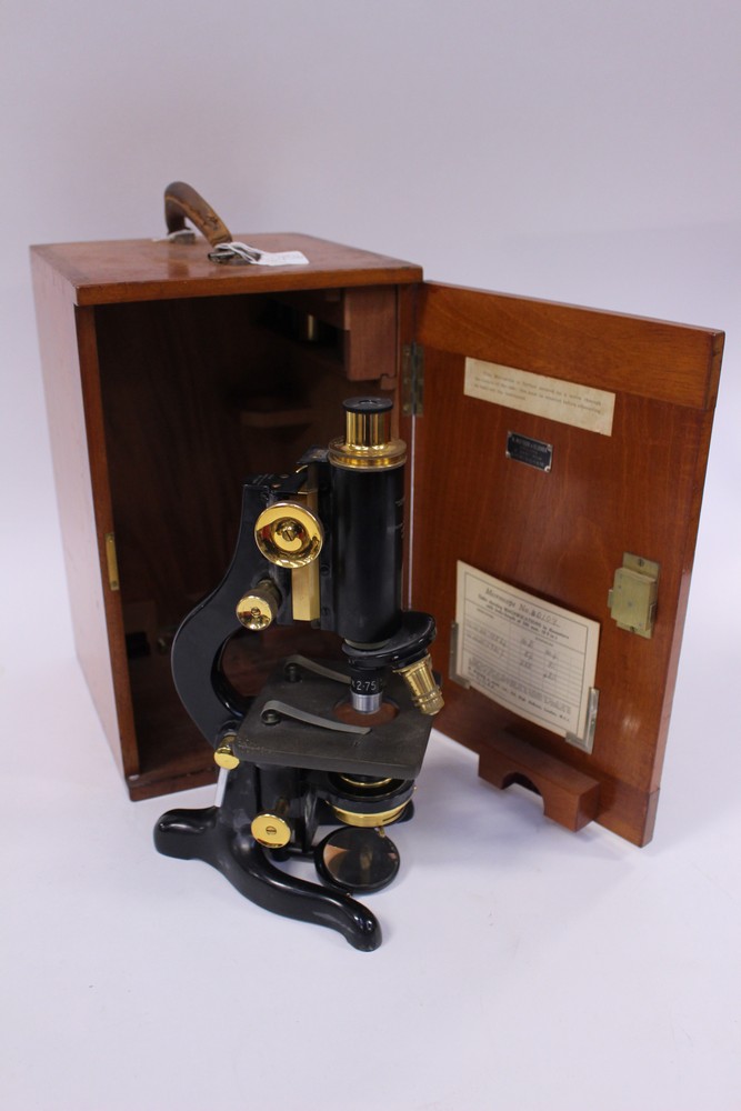 A Watson of London compound microscope, with fittings,