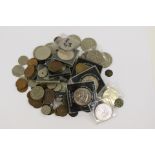 A bag of coins includes USA Peace dollar 1923,