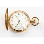 A gold plated half hunter Waltham pocket watch, subsidiary seconds dial and Arabic numerals,