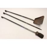 Three fire irons, by Derbyshire Blacksmith Simon Vaughan, comprising coal shovel,