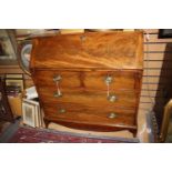 A George III mahogany bureau, the fall front opening to reveal a fitted interior,