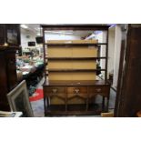 ****Ex Luddington Manor****A Georgian oak dresser and rack, the rack with three plate shelves,