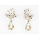 A pair of diamond 14ct white gold spray earrings each with thirteen small diamonds together with a