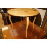 A 20th Century sycamore circular topped table, by 'A.