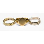 Three 9ct gold rings comprising a yellow gold and white stone eternity style ring,