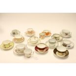 A collection of various Staffordshire cups and saucers,