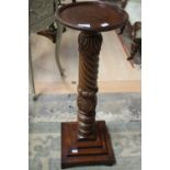 ****Ex Luddington Manor****A 19th Century carved rope twist and acanthus leaf dish top torchere,