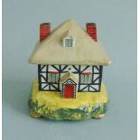 A Staffordshire pottery Dudson Pastille Burner in the form of a cottage Date circa 1825-42 Size