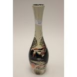 A Moorcroft vase in the 'Christmas in the Cotswolds' pattern, 1st quality vase,