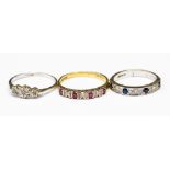 Three gold rings, comprising two 18ct half eternity rings one set with ruby and diamonds, size Q,