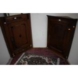 Two 19th Century oak hanging corner cupboards,