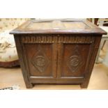 ****Ex Luddington Manor****A small oak two door panelled and carved cupboard,