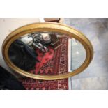 ****Ex Luddington Manor****19th Century oval bevelled plate glass wall mirror, in gilt frame,