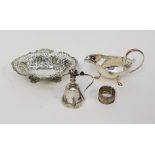 A silver sauce boat, Birmingham 1902, together with a white metal reticulated bon bon dish,