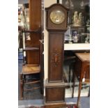 A early 20th Century oak Grandmother clock, having an eight day movement,