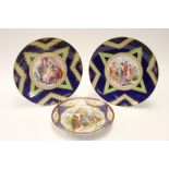 A pair of large Vienna porcelain chargers,