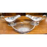 A pair of Elkington and Co silver plated sauce boats in the George II style,