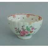 A Lowestoft Porcelain Ribbed Tea bowl, decorated with Floral sprays Circa 1760 Size - 7.