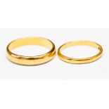 Two 22ct gold plain wedding rings, one 3mm wide, N1/2 , the other 1.