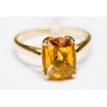 A Citrine and 9ct gold dress ring set with a checkerboard cushion cut stone, size N,